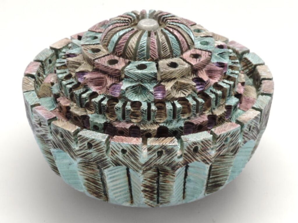 Layered, turned wood sculpture by Ken Deaner