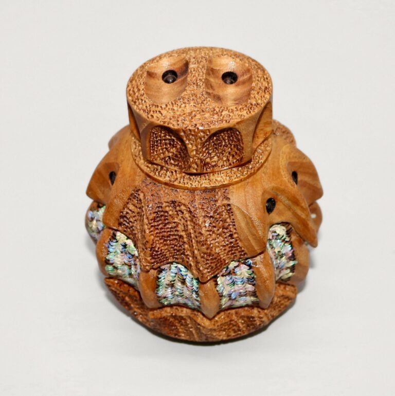 Faces, turned wood sculpture by Ken Deaner